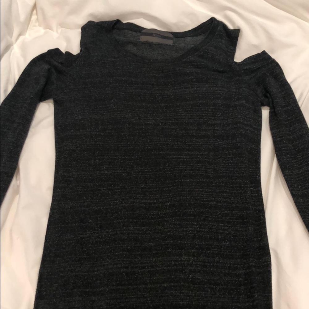 Sweater with shoulder cut outs
